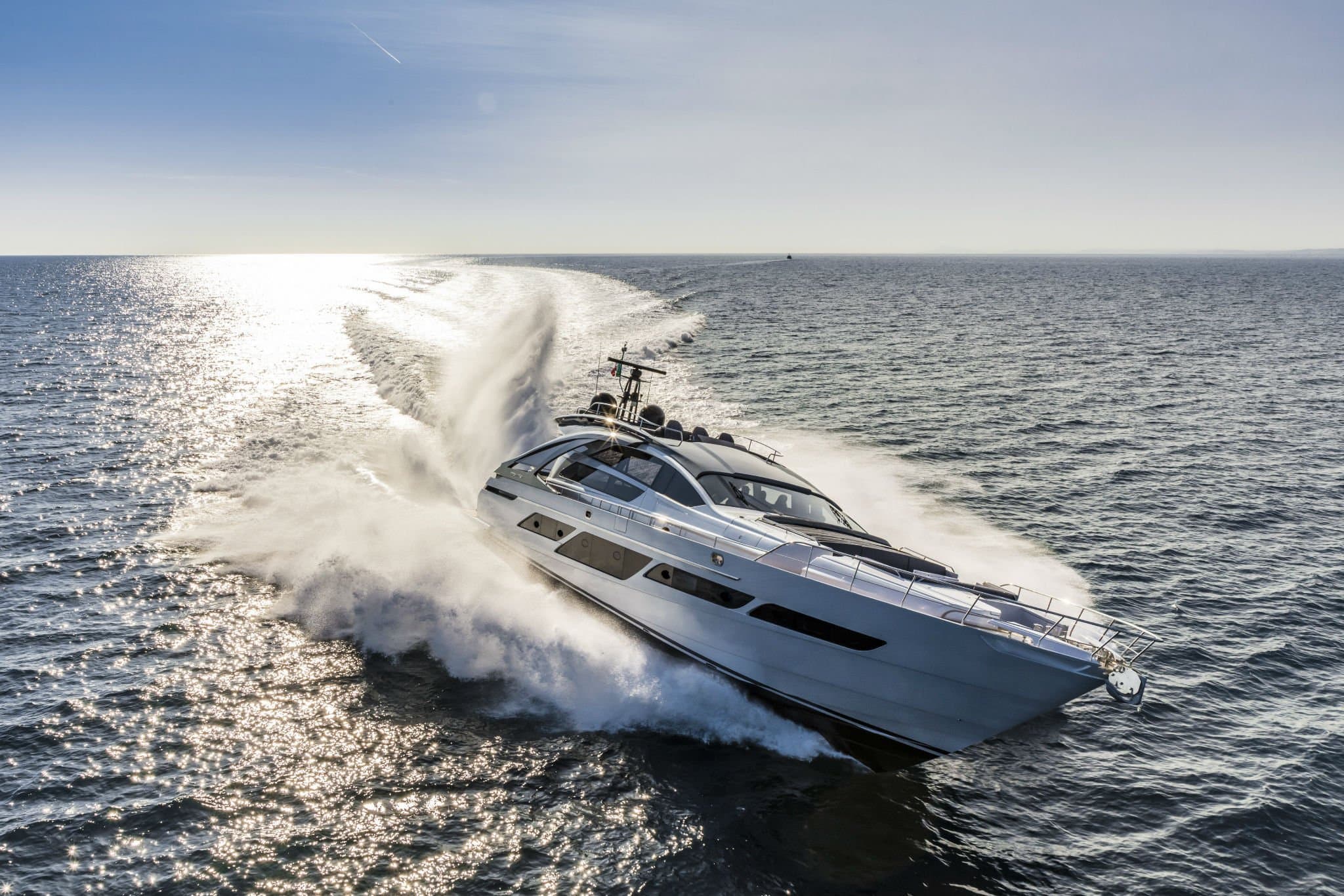 Pershing sport yacht running at speed on open water