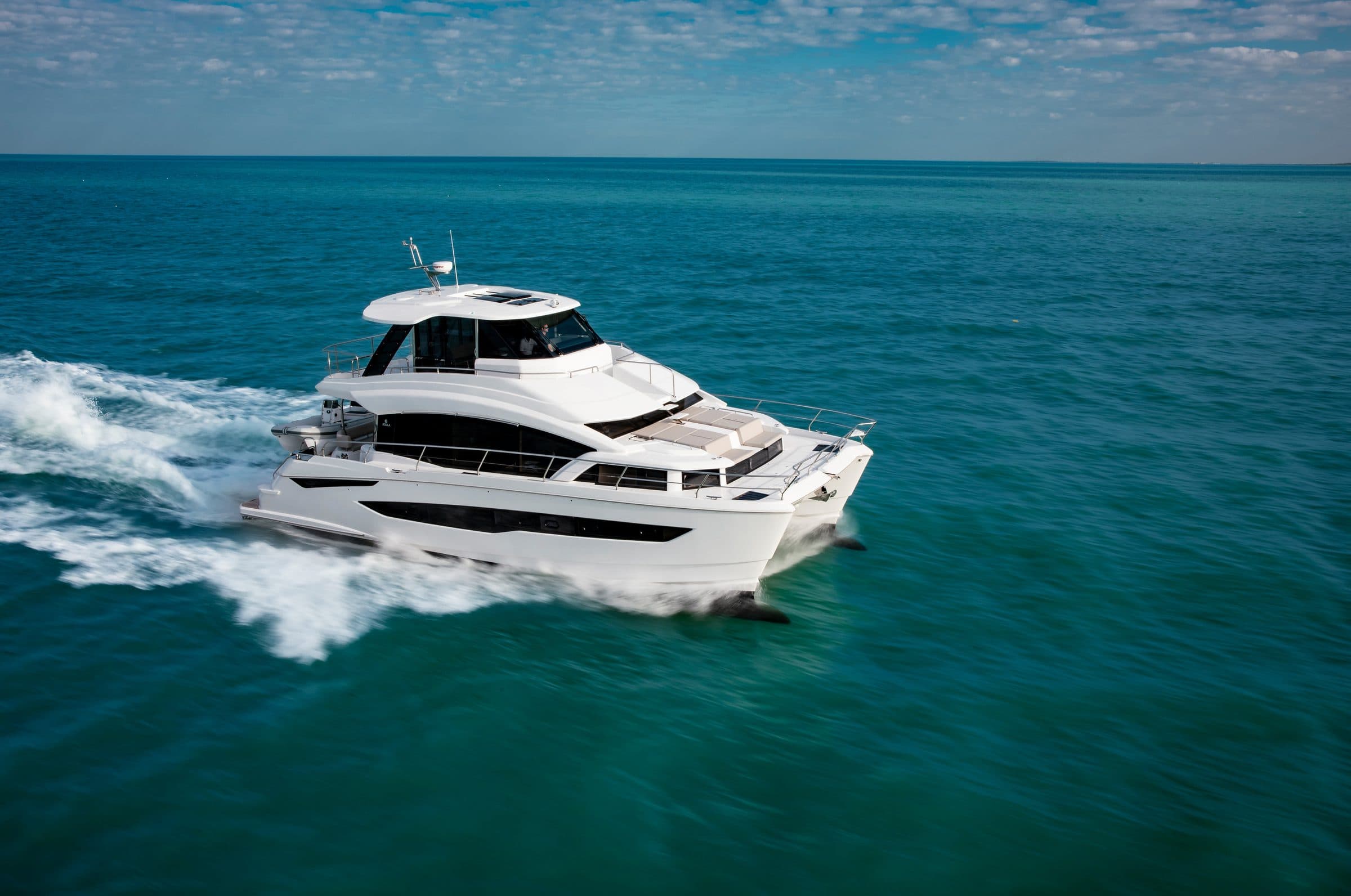 Aquila 54 Yacht power catamaran running at speed in open water