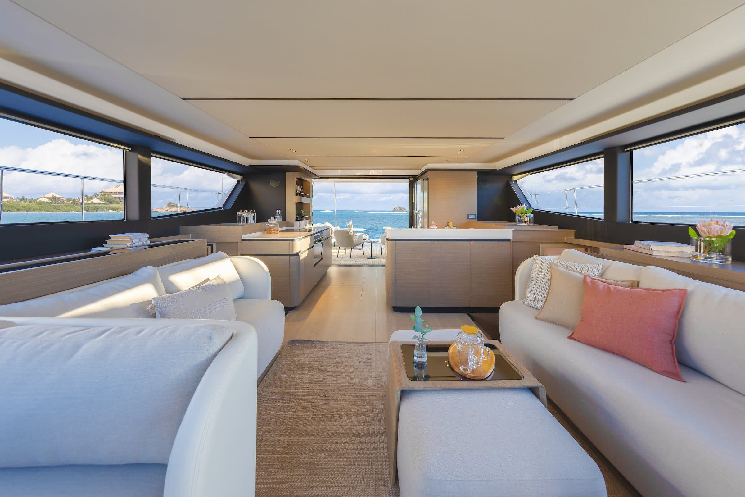 Main salon of the Leopard 53 Powercat with sofas, coffee table and panoramic windows