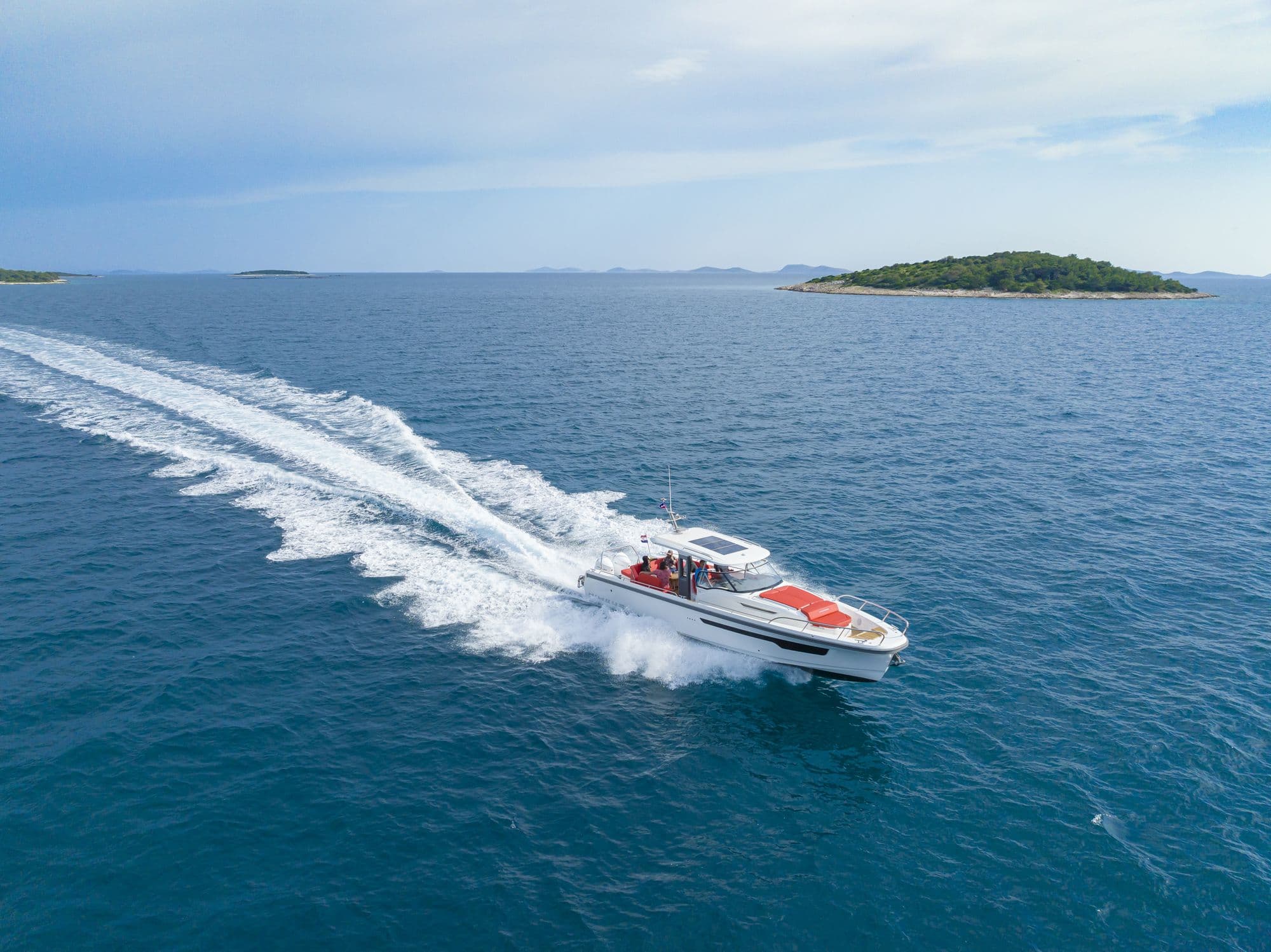Aerial view of the Nimbus T11 running across open water