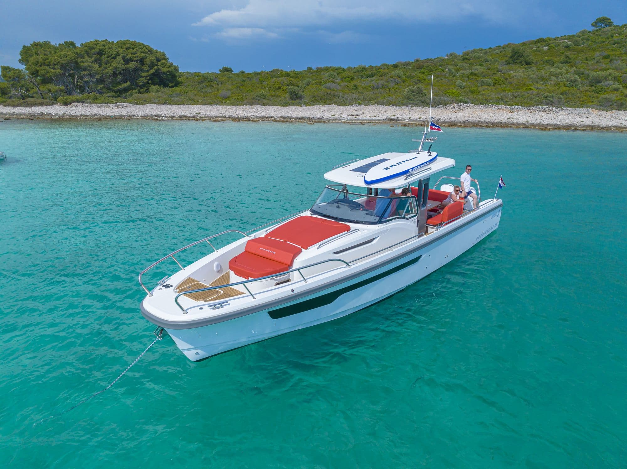 Nimbus T11 at anchor in turquoise water seen from above