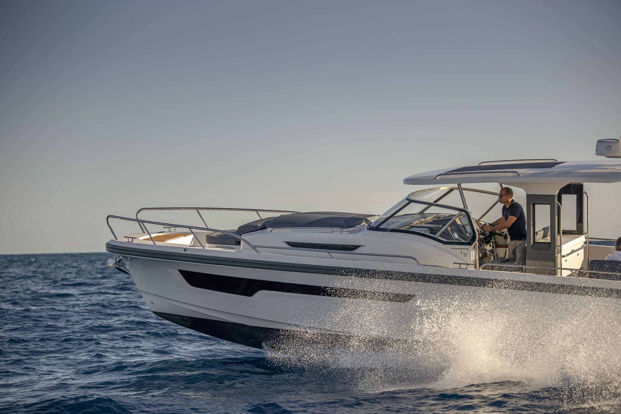 Nimbus T11 at speed, seen close from the bow quarter