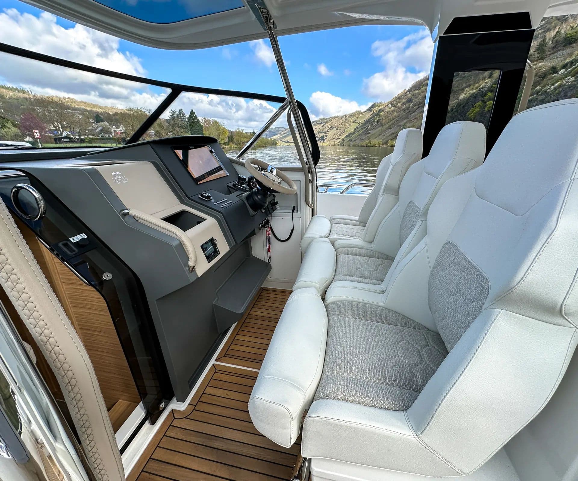 Helm seats and console of the Nimbus T12 (Sport Tender 42)