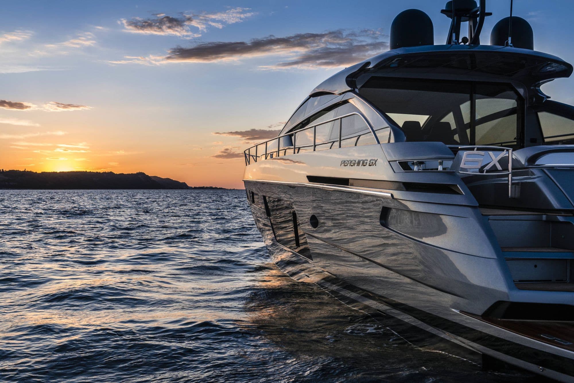 Pershing 6X on the water at sunset