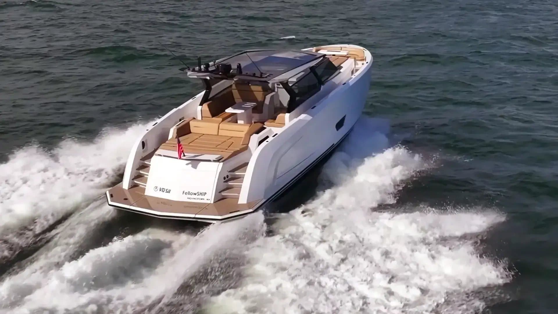 Aerial view of the Vanquish VQ58 at speed showing the walkaround deck