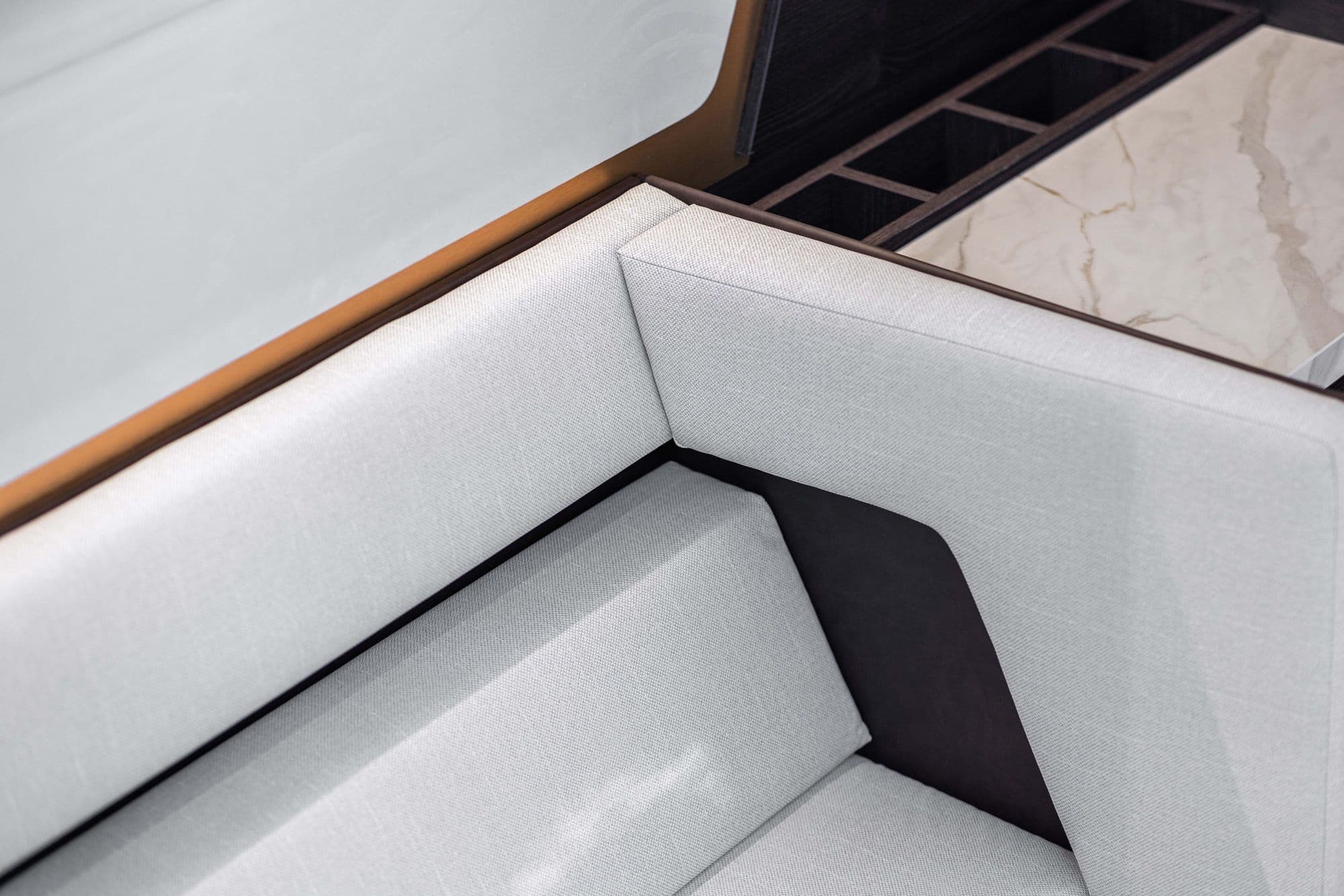 Sofa and marble-look detail inside the Vanquish VQ70