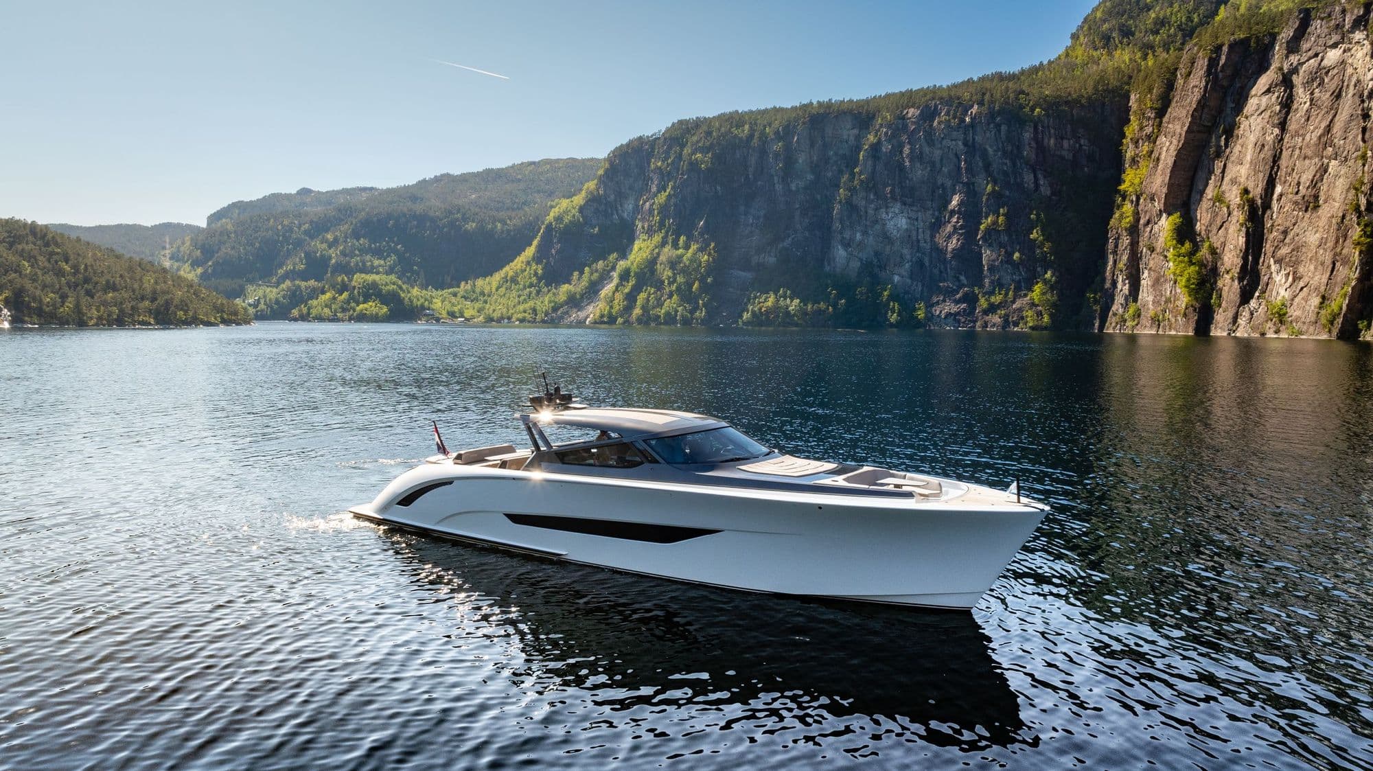 White Wajer 77 running through a fjord