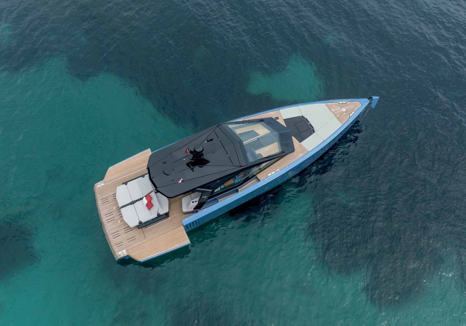 Aerial view of the wallypower58 at anchor in turquoise water