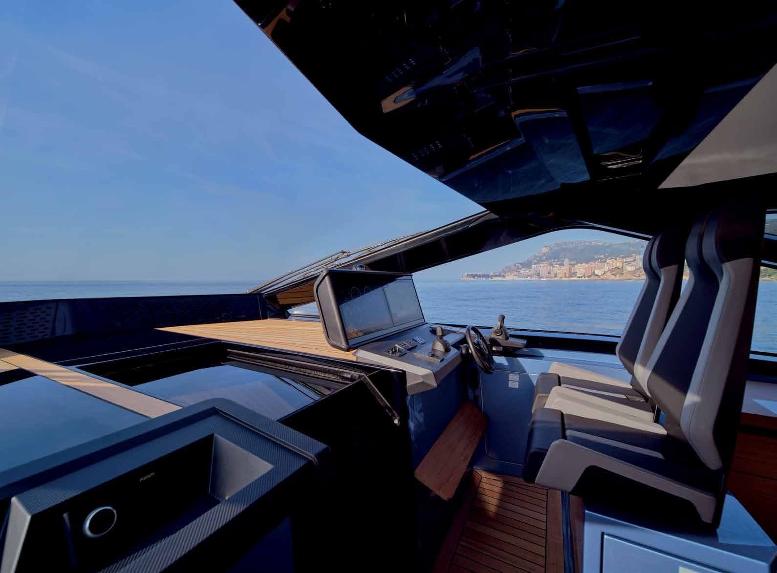 Helm of the wallypower58 under the glass dome with two pilot seats