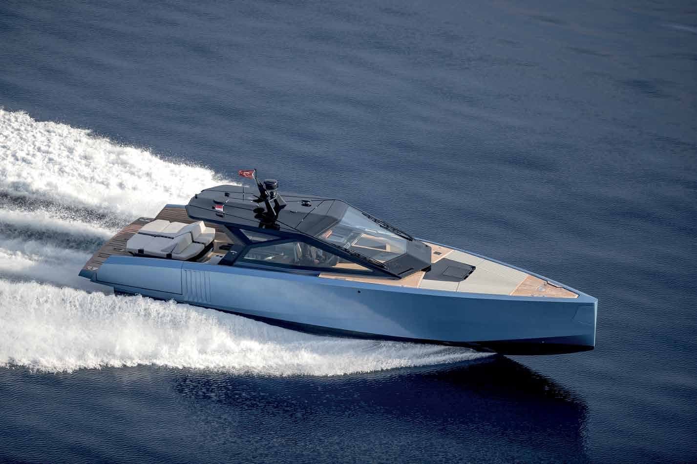 Wally wallypower58 running at speed, showing its glass dome and pale grey hull