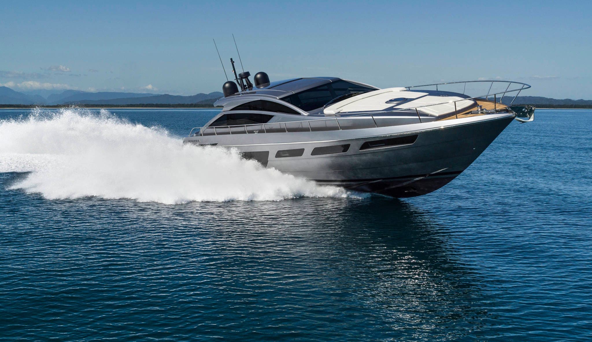 Pershing 6X sport yacht running at speed on open water