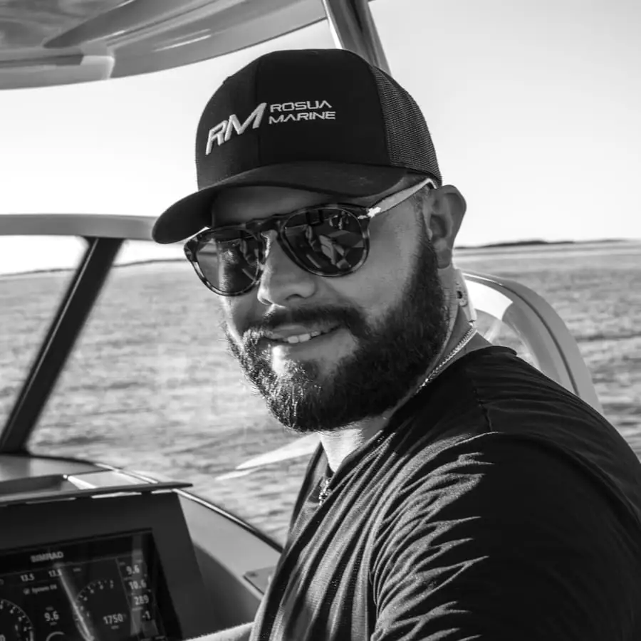 Daniel Rosua at the helm of a motor yacht